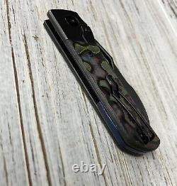 Couteaux Divo Stout 80s Camo en carbone BW avec lame en acier 20CV et dos en Timascus