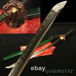Lame de sabre japonais en acier plié damassé, trempée à l'argile, avec tsuba en cuivre de samouraï