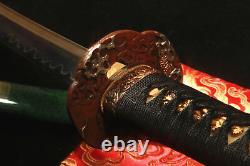 Lame de sabre japonais en acier plié damassé, trempée à l'argile, avec tsuba en cuivre de samouraï